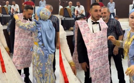 Takı töreninde inanılmaz görüntüler! Düğünde damada paradan yelek giydirildi